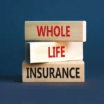 Whole life insurance symbol. Concept words Whole life insurance on beautiful wooden blocks. Beautiful grey table grey background. Business whole life insurance concept. Copy space.