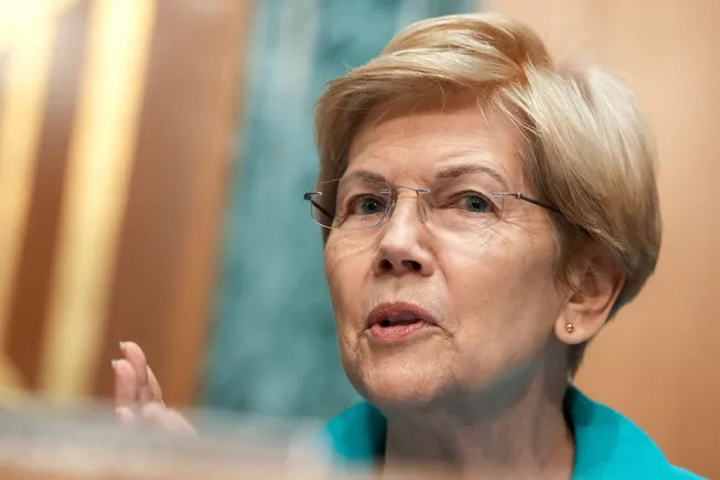 the-revolving-door-under-scrutiny-senator-warren-demands-transparency-on-capital-one-cfpb-ties