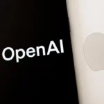 Apple,Laptop,With,Smartphone,On,Top,Having,Openai,Logo.,Concept