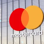 Purchase, Harrison, NY, USA. May 2, 2022. Editorial Use Only, 3D CGI. Mastercard Signage Logo on Top of Glass Building. Workplace Financial Services Company Office Headquarters.