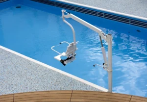 Swimming pool disability hoist