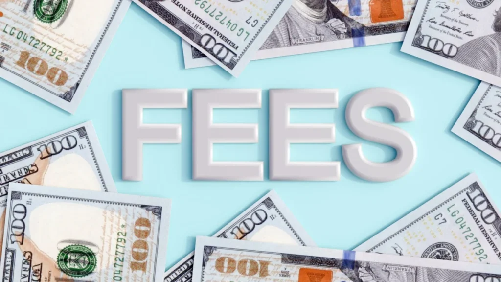 3d rendering of the word "FEES" and US hundred dollar bills (USD).
