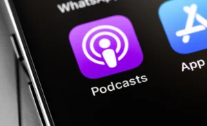 Apple,Iphone,With,Podcasts,Icon,App,On,Screen,,Macro.,Apple