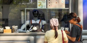 navigating-the-ai-paradox-artificial-intelligence-sectoral-shifts-and-the-future-of-the-renminbis-real-exchange-rate