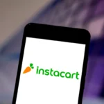 In this photo illustration the Instacart logo is seen